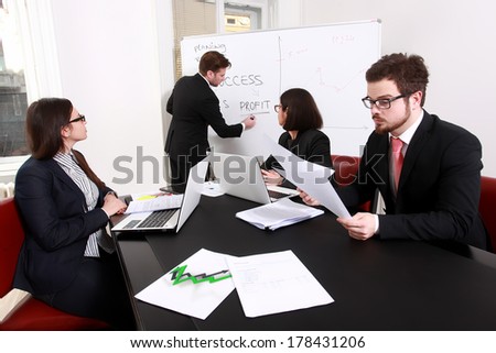 Business people having board meeting