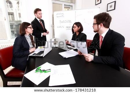 Business people having board meeting