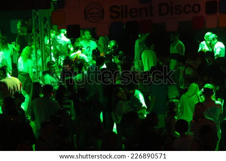 NOVI SAD, SERBIA - JULY 13: Crowd enjoying silent disco stage at Exit festival on July 13th, 2014 in Petrovaradin fortress