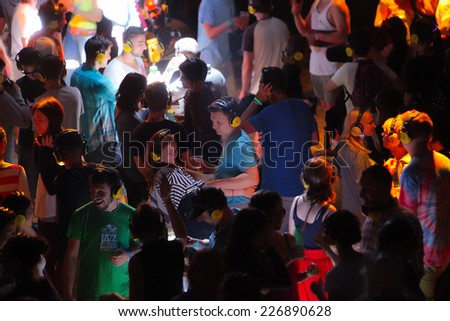 NOVI SAD, SERBIA - JULY 13: Crowd enjoying silent disco stage at Exit festival on July 13, 2014 in Petrovaradin fortress