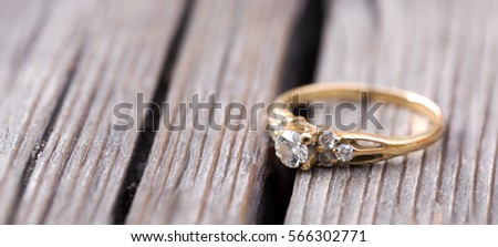 wedding ring on wood