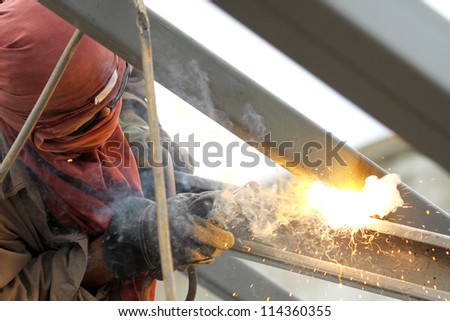 Sparks during cutting of metal by gas welding at work place