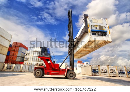 Forklift Handling The Reefer Container Box At Dockyard