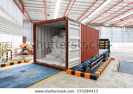 trucks at loading meal at dock shipping industry warehouse