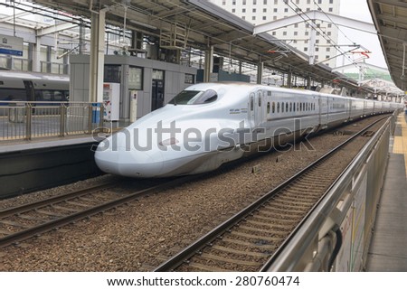 TOKYO - MAY 18: Shinkansen bullet train at Tokyo railway station in May 18, 2015 Tokyo, Japan.Shinkansen is world\'s busiest high-speed railway operated by four Japan Railways companies.