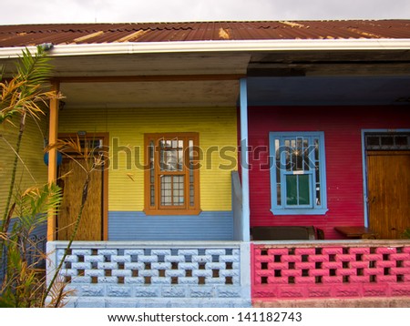 Colorful Living, Red and Yellow House with Palm Tree, San Jose, Costa Rica, Central America
