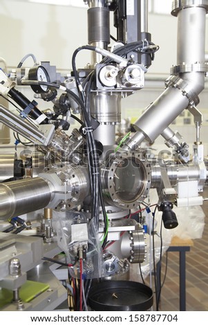 View of Important electronic and mechanical parts of Mass spectrometer in ION Accelerator command room, CNC machined parts, tilt shift lens, selective focus