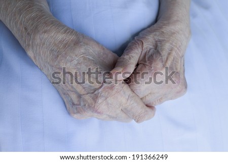 Old wrinkle hands of 93 years old lady, close up, selective focus, series of high resolution photos