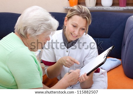 female doctor with an elderly woman makes an checkup