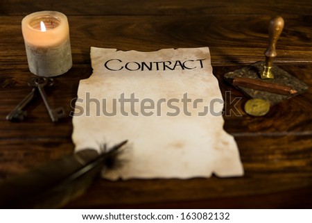 an old parchment with the word Contract