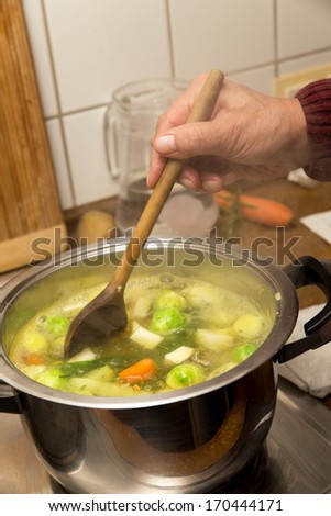 close up cooking vegetable soup