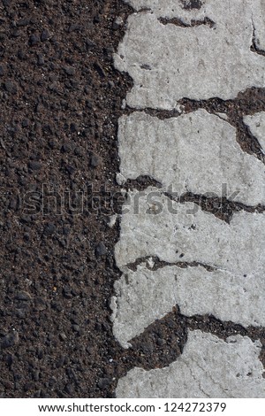Background with cracked road .