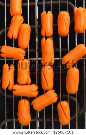 Sausages on electric grill.