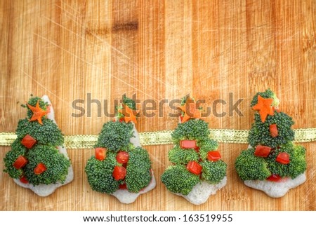 Christmas tree of bread  broccoli and tomatoes for christmas food