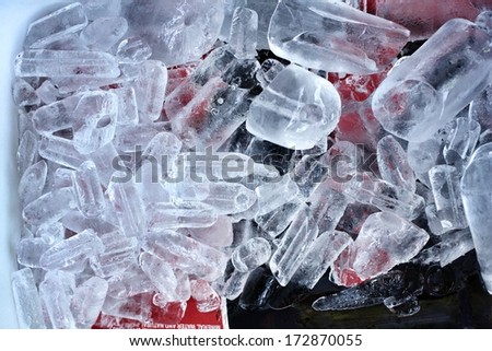 Bottles of red wine on ice