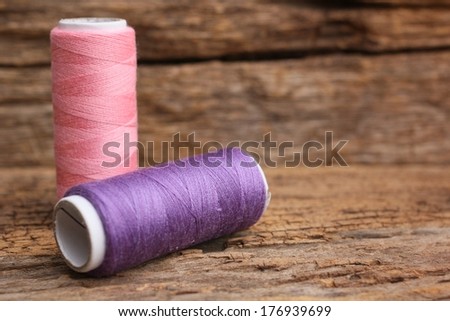 Pink and purple bobbins thread background texture