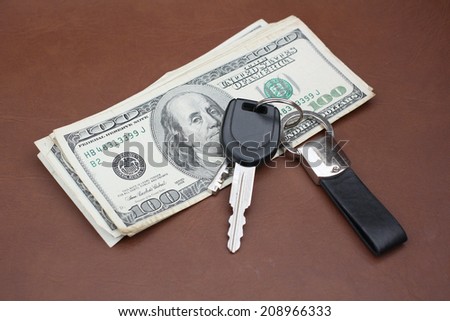 car key with dollars