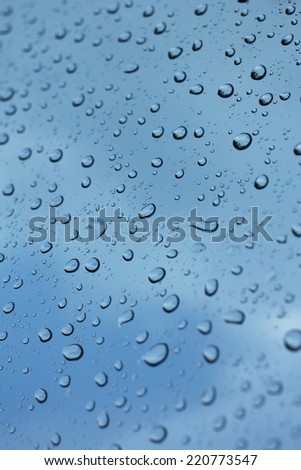 Water drop on glass - windshield rain.