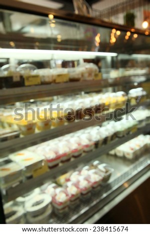 blurred of cake at coffee shop