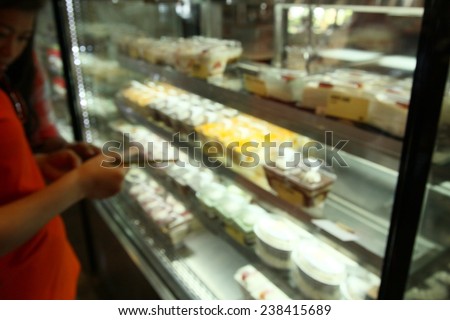 blurred of cake at coffee shop