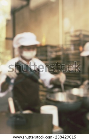 Blurred of chef cooking at bakery shop