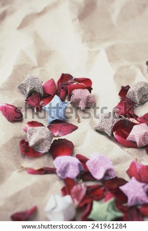 Rose petals with paper stars