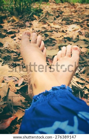 Selfie of woman feet and relaxing in forest