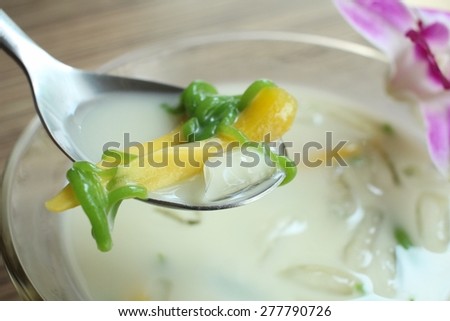 Dessert of green noodle with coconut milk