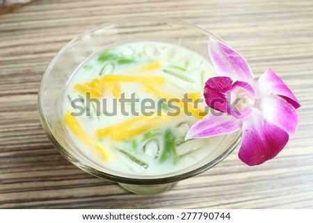 Dessert of green noodle with coconut milk