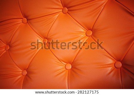 Vintage orange leather sofa