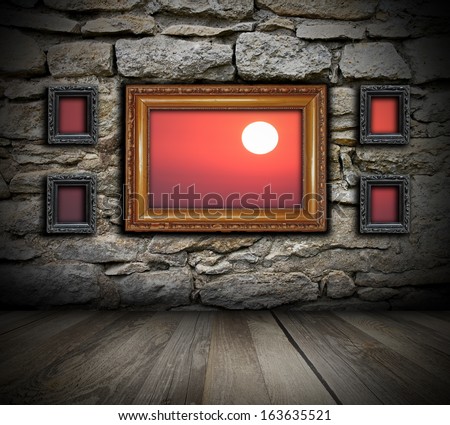 vintage painting frames like windows on wall and beautiful sunrise seen through ( the background in also a photo I made )
