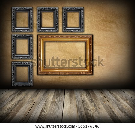 art indoor background with beautiful wood frames on brown wall