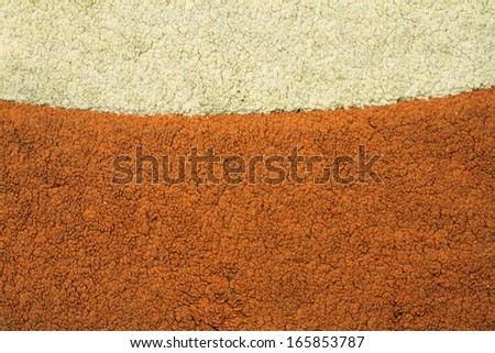 messy and dirty old carpet with two different colors