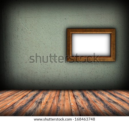 minimalist indoor backdrop with wood frame on green plaster wall