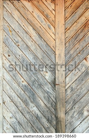 small spruce beige planks mounted on wall at an angle, wooden texture