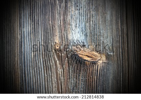 old beautiful texture of knotted  wood with added vignette
