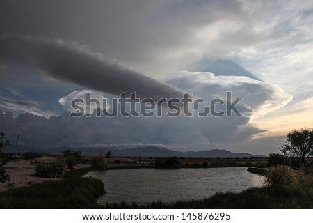 Detached roll cloud over water during stormy summer weather in semi-desert Arizona state, USA/Roll Arcus Cloud in Thunder Weather Cloudscape/Roll cloud during stormy weather