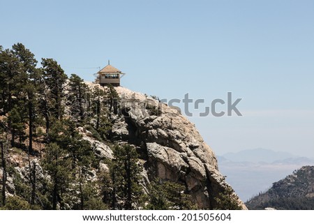 Mt. Lemmon Rock Fire Lookout cabin built in 1928, in Arizona state, USA/Fire Lookout Cabin at about 8800 feet/2682 meters elevation/One-room fire lookout perches on high granite rock in Catalina Mts.