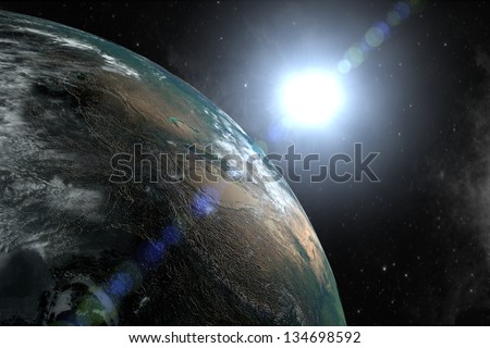 Beautiful planet earth seen from space with the rays of the sun