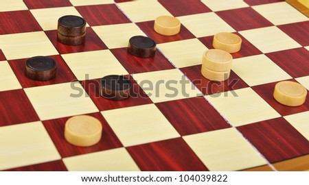 Detailed photo of the checkers board game