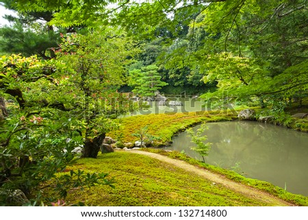 Zen Garden with lotus leaves and a pond in Kyoto, Japan