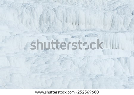 Pamukkale (cotton castle) natural wonder is created by a layers of white travertine looking like cotton, Turkey