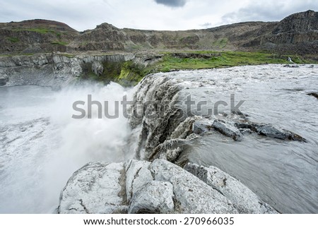Hafragilsfoss is the very powerful waterfall on Iceland not far from its bigger brother Dettifoss. It is located in Jokulsargljufur National Park the northeasten Iceland on the river Jokulsa Fjollum.