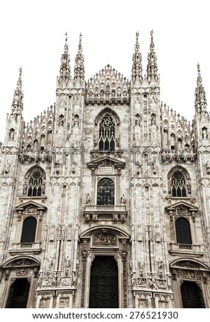 Famous Milan Cathedral is the fifth largest cathedral in the world. Detail of the front isolated on white Milan, Italy