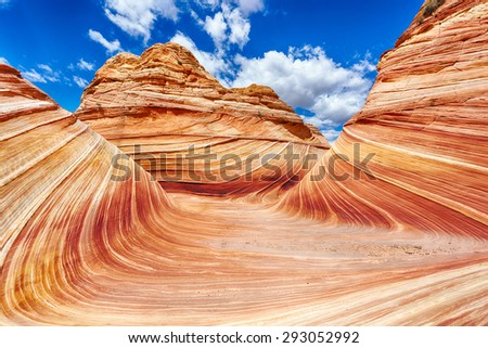 The Wave is an awesome vivid swirling petrified dune sandstone formation in Coyote Buttes North. It could be seen in Paria Canyon-Vermilion Cliffs Wilderness, Arizona. USA
