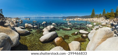 Beautiful boulders and crystal clear water of the lake Tahoe. Hidden Beach, Lake Tahoe - Nevada, USA. Panoramic photo