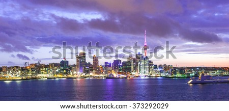 Skyline photo of the biggest city in the New Zealand, Auckland. Panoramic photo was taken after sunset across the bay