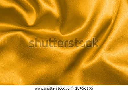 Beautiful and shiny golden satin background - for luxury designs