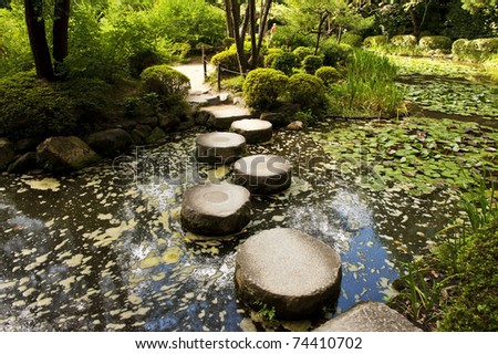 Zen stone path in a Japanese Garden near Heian Shrine. Heian Shrine is one of biggest Japanese buddhist temples in Kyoto. Japan