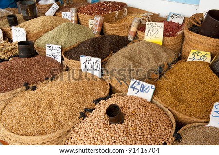 Beautiful vivid oriental market with baskets full of various spices